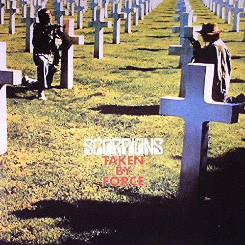 "Album cover with two men in a graveyard, 'Scorpions Taken by Force' text."