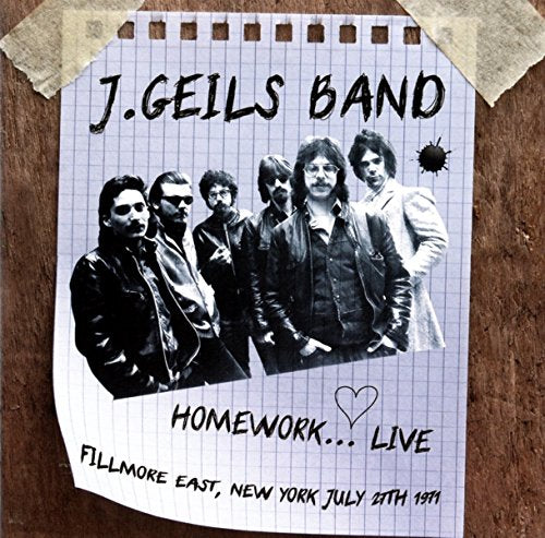 Black and white photo of J. Geils Band on a notebook background.