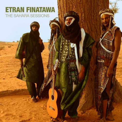 "Album cover featuring four men in desert robes, one holding a guitar."