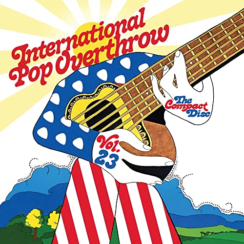 CD cover: bass guitar with American flag design and sunburst background.