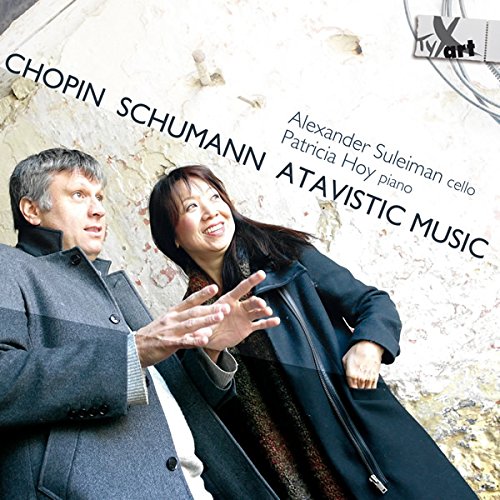 CD cover featuring a man and woman in coats against a white stone background.