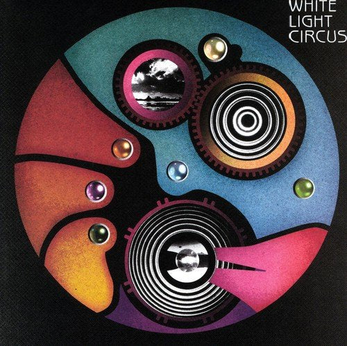 Colorful abstract vinyl record cover with gears, eyes, and a sky scene.