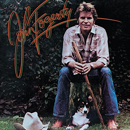 John Fogerty album cover featuring the musician with a dog and hat.