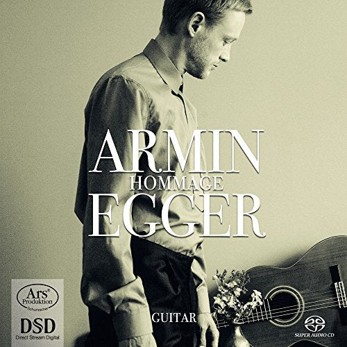 Man holding a guitar with flowers, sepia-toned album cover with white text.