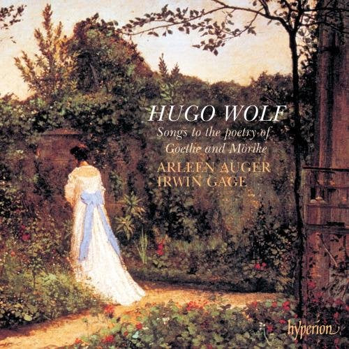 "CD cover featuring a woman in a long dress in a garden."