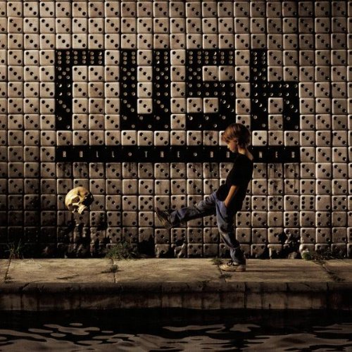 "CD cover art: man kicking dice-shaped wall with skull, near water."