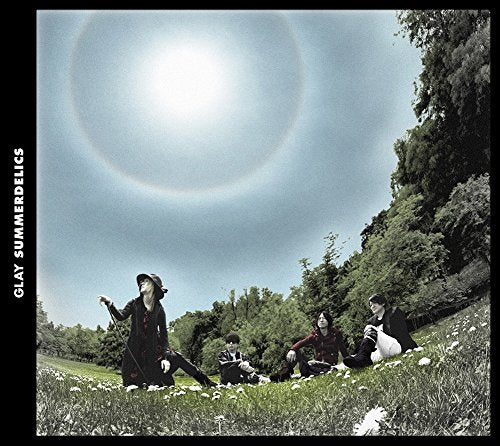 CD cover: group in a field under a bright, hazy sun.