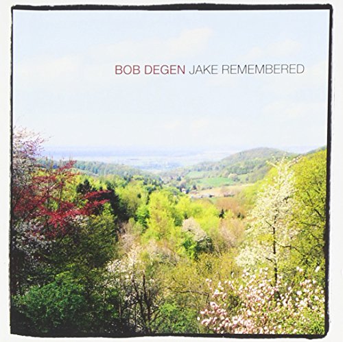 Album cover with serene landscape, trees, and hills under a light blue sky.