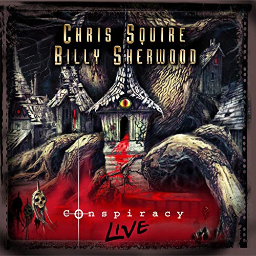 "Album cover art: dark, eerie village scene with 'Conspiracy Live' text."