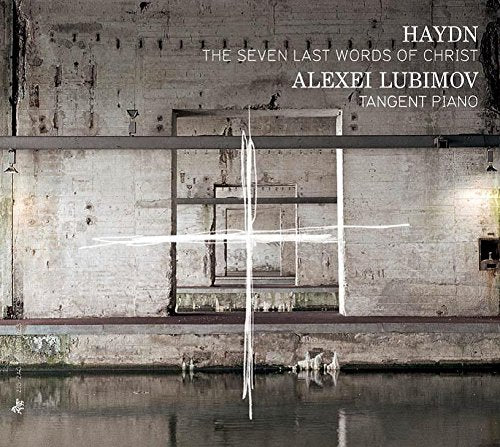 "CD cover with a cross over water, against a concrete wall background."
