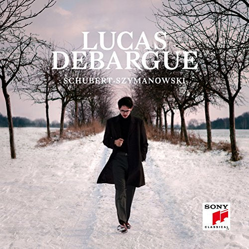 Man in black coat walks alone in snowy landscape, album cover with white text overlay.