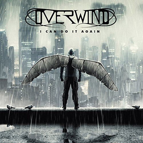 CD cover: figure with wings stands on a ledge in the rain.
