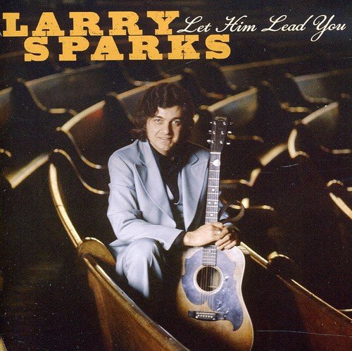"Album cover featuring Larry Sparks holding a guitar in a church pew."