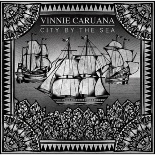 "CD cover featuring a blue-toned illustration of sailing ships and ornate border."