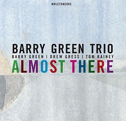 "Album cover with 'Almost There' in multicolored text on a textured grey background."