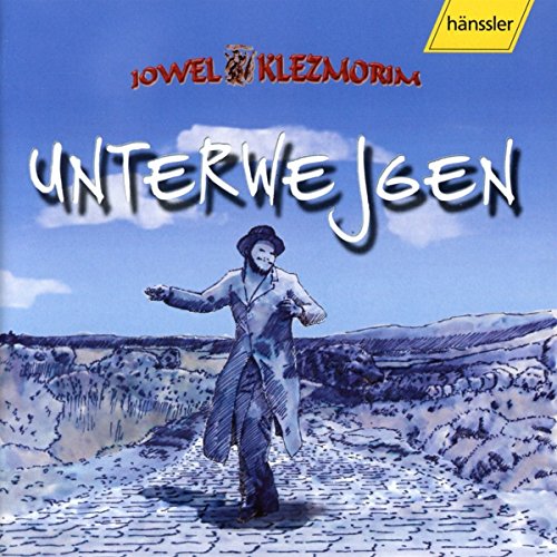 "CD cover art featuring a man dancing on a cobblestone path in a landscape."