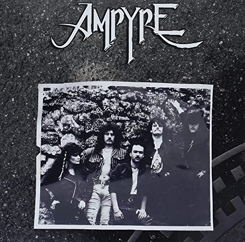 Black and white vinyl record cover featuring a band portrait.