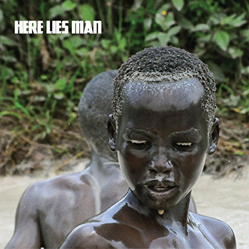 CD cover: portrait of a young Black man with another blurred figure.