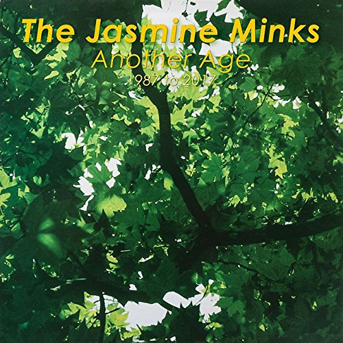 Album cover with tree leaves and yellow text overlay.