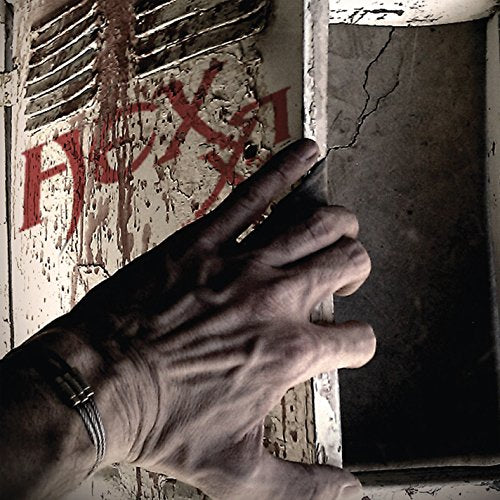 Hand reaching toward red graffiti on a weathered, cracked white surface.
