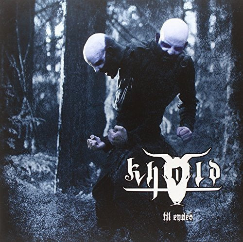 Vinyl album cover with two bald men in a dark forest scene.