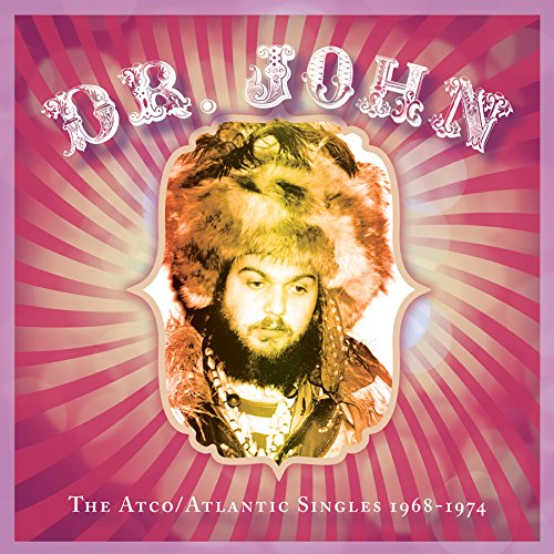 Album cover with man in fur hat on pink striped background.