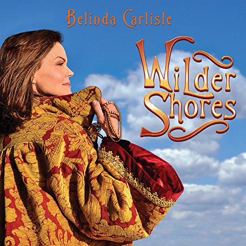 Belinda Carlisle album cover, “Wilder Shores,” with a woman in gold fabric.