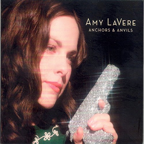 "A woman holding a sparkly object, with album title and artist name."