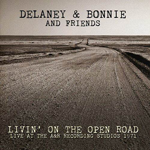 CD cover: winding dirt road under a cloudy sky, text at top and bottom.