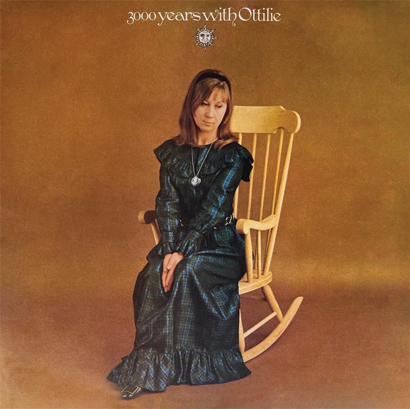Ottilie Patterson album cover: woman in dress sitting in rocking chair.