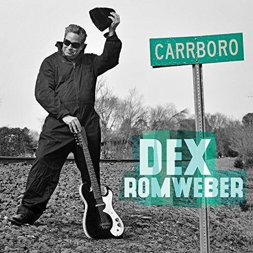 Black and white vinyl album cover featuring Dex Romweber with a guitar beside a sign.
