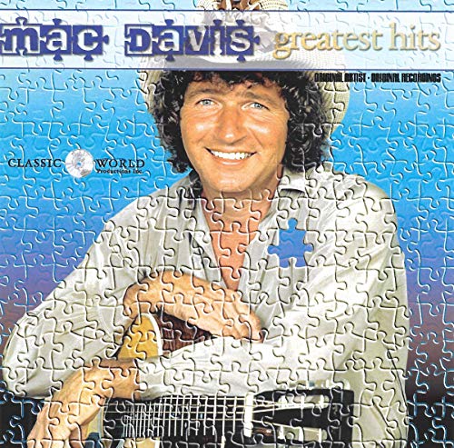 Mac Davis’s “Greatest Hits” CD cover, featuring him as a jigsaw puzzle.