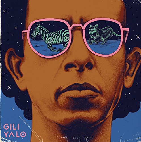 "Album cover featuring a man wearing pink sunglasses with animal reflections."
