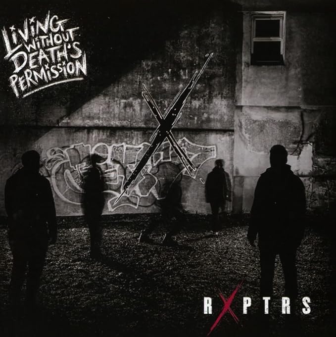 Dark album cover with silhouetted figures before a graffitied building.