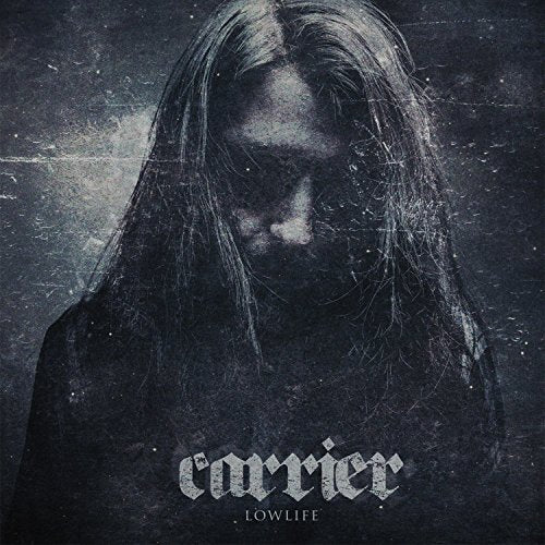 Album cover with a person with long hair against a dark, grungy background.