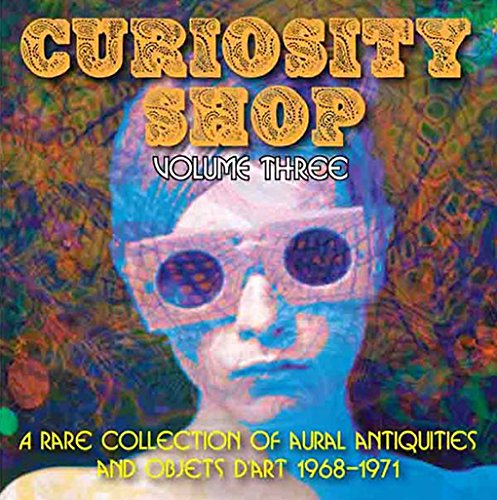 CD cover: psychedelic portrait with text “Curiosity Shop Volume Three.”