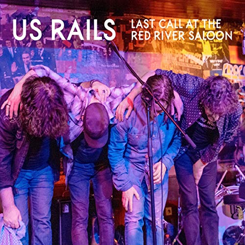 "Album cover featuring a band on stage with arms around each other."