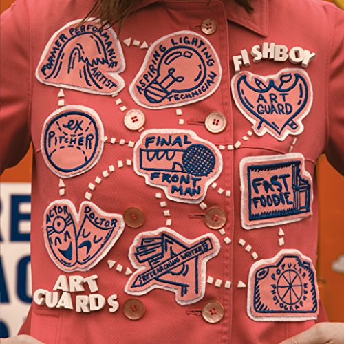 Red jacket covered in white patches with various job titles and icons.