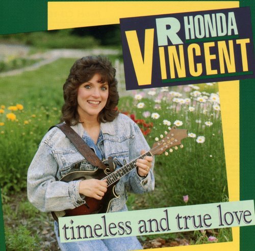 "CD cover featuring Rhonda Vincent holding a mandolin in a field of flowers."