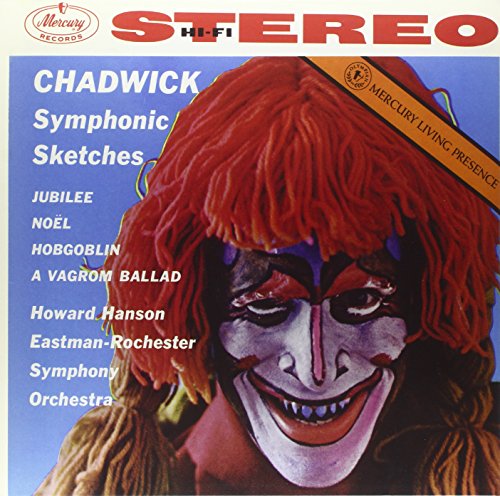 Vinyl record cover featuring a man with a red wig and painted-on smile.