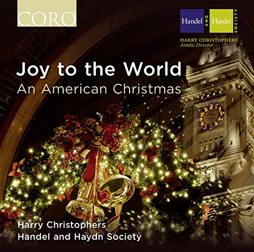 "CD cover with Christmas tree and building, titled 'Joy to the World'."