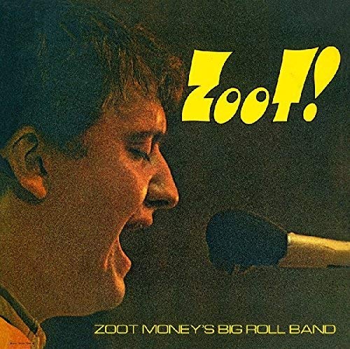 Vinyl album cover featuring a man singing into a microphone.