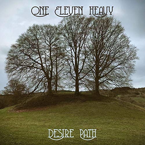 "CD cover featuring three bare trees on a hill with text 'One Eleven Heavy Desire Path'."