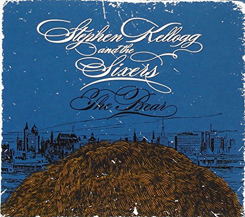 Album cover with blue background, cityscape, and brown bear illustration, featuring white and black text.