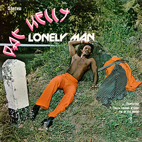 Vinyl album cover with a man lying on grass, wearing orange pants.