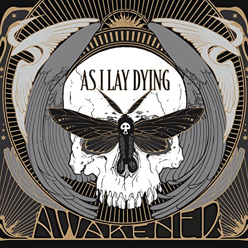 "Album cover art featuring a skull with a moth and ornate gold and black design."