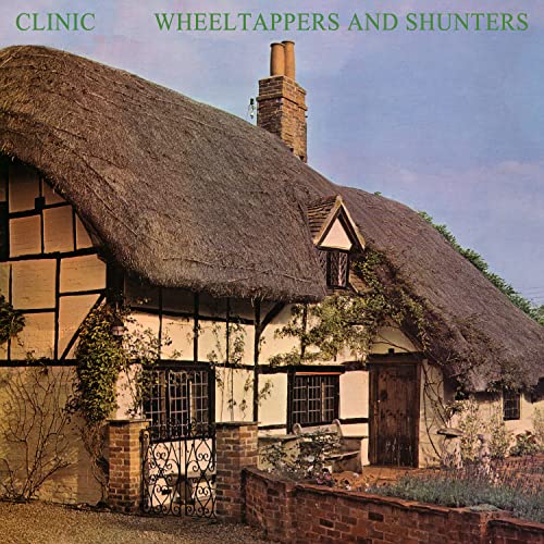 CD cover: thatched-roof cottage with brickwork, titled "Clinic - Wheeltappers and Shunters".