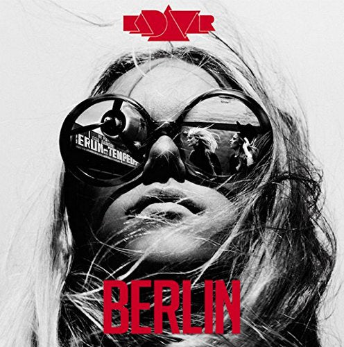 Album cover with a person wearing goggles, red logo, and "Berlin" text.
