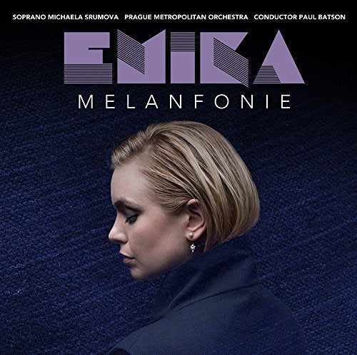The image is a vinyl album cover featuring a woman's profile. #### Alt text: Woman with blonde hair and dark coat on a dark blue background.