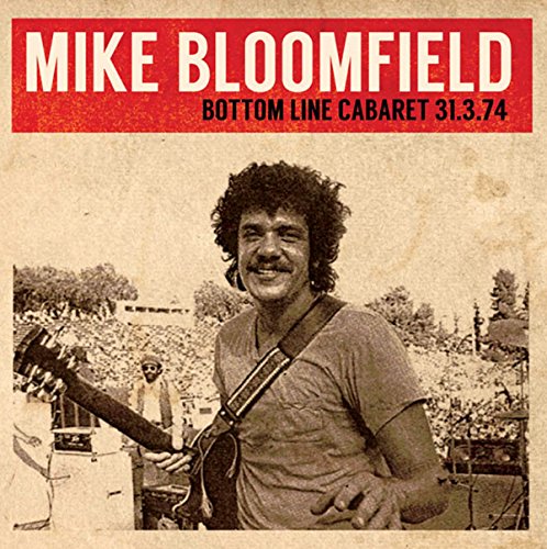 Mike Bloomfield album cover featuring a man holding a guitar, smiling, on a stage.